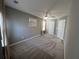Spacious bedroom with ceiling fan and neutral carpeting at 413 Trotters Ln, Moncks Corner, SC 29461