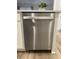 Stainless steel dishwasher nestled in the kitchen island for easy dish cleaning at 413 Trotters Ln, Moncks Corner, SC 29461