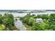 Aerial view of a waterfront home with lush greenery at 5105 St George Ln, Hollywood, SC 29449
