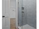 Bathroom featuring a glass enclosed shower and grey hexagonal tile at 5105 St George Ln, Hollywood, SC 29449