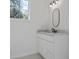 Bathroom featuring a vanity with marble countertop and an oval mirror at 5105 St George Ln, Hollywood, SC 29449
