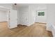 Bright bedroom featuring hardwood floors and an open layout at 5105 St George Ln, Hollywood, SC 29449