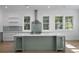 Modern kitchen features a large island, stainless steel appliances, and ample natural light at 5105 St George Ln, Hollywood, SC 29449
