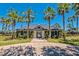 Community pool access with palm trees and lush landscaping at 5105 St George Ln, Hollywood, SC 29449