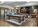 Finished basement with pool table, bar area, and leather furniture at 6411 China Back Ln, Meggett, SC 29449