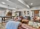 Spacious basement recreation area with leather sofas and pool table at 6411 China Back Ln, Meggett, SC 29449