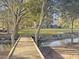 Wooden boardwalk leads to a waterfront home with marsh views at 6411 China Back Ln, Meggett, SC 29449