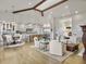 Open concept living area with kitchen, dining, and sitting areas at 6411 China Back Ln, Meggett, SC 29449