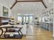 Open floor plan with hardwood floors, vaulted ceilings and kitchen at 6411 China Back Ln, Meggett, SC 29449