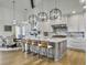 Spacious kitchen boasts an island, stainless steel appliances, and marble at 6411 China Back Ln, Meggett, SC 29449