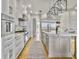 Gourmet kitchen features stainless steel appliances and marble countertops at 6411 China Back Ln, Meggett, SC 29449