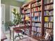 Spacious library with hardwood floors and extensive book collection at 6411 China Back Ln, Meggett, SC 29449