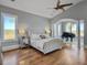 Large main bedroom with hardwood floors and a sitting area at 6411 China Back Ln, Meggett, SC 29449