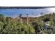 Aerial view of waterfront property with private dock at 820 Pineneedle Way, Charleston, SC 29492