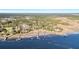 Aerial view of waterfront property with multiple docks at 820 Pineneedle Way, Charleston, SC 29492