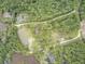 Aerial view of property with home and surrounding landscape at 820 Pineneedle Way, Charleston, SC 29492