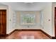 Bright dining area with large window and hardwood floors at 820 Pineneedle Way, Charleston, SC 29492