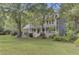 Two story house with wrap around porch and large yard at 820 Pineneedle Way, Charleston, SC 29492