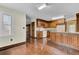 Classic kitchen with wood cabinets, white appliances, and hardwood floors at 820 Pineneedle Way, Charleston, SC 29492