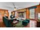 Cozy living room with wood burning stove and hardwood floors at 820 Pineneedle Way, Charleston, SC 29492