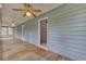 Long screened porch with wood floors and access to bedrooms at 820 Pineneedle Way, Charleston, SC 29492