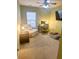 Multi-purpose bedroom with desk and comfy chair at 8781 Red Oak Dr, North Charleston, SC 29406