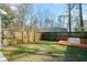 Private backyard with wooden deck and fenced perimeter at 9159 Parlor Dr, Ladson, SC 29456