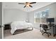 Spacious bedroom with large window, carpeted floor, and workspace at 9159 Parlor Dr, Ladson, SC 29456