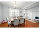Dining room with hardwood floors, table, and chairs at 9159 Parlor Dr, Ladson, SC 29456