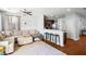 Living room with beige sectional sofa and hardwood floors at 9159 Parlor Dr, Ladson, SC 29456