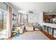 Living room with beige sectional sofa and hardwood floors at 9159 Parlor Dr, Ladson, SC 29456