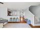 Living room with hardwood floors, sectional sofa, and view of stairs at 9159 Parlor Dr, Ladson, SC 29456