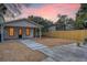 Private backyard with a patio and wooden fence at 929 Rutledge Ave, Charleston, SC 29403