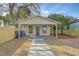 Detached studio with covered porch and stone walkway at 929 Rutledge Ave, Charleston, SC 29403