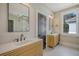 Contemporary bathroom with double vanity and natural light at 929 Rutledge Ave, Charleston, SC 29403