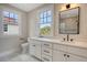 Elegant bathroom with double vanity and quartz countertops at 929 Rutledge Ave, Charleston, SC 29403