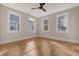 Spacious bedroom with hardwood floors and ceiling fan at 929 Rutledge Ave, Charleston, SC 29403