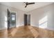 Bright bedroom with hardwood floors and access to bathroom at 929 Rutledge Ave, Charleston, SC 29403