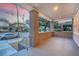 Spacious front porch with brick pillars and a view of the street at 929 Rutledge Ave, Charleston, SC 29403