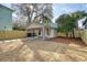 Detached guest house with covered patio, new construction, and a fenced yard at 929 Rutledge Ave, Charleston, SC 29403