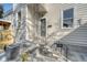 Side entrance with concrete steps, metal railing, and air conditioning unit at 929 Rutledge Ave, Charleston, SC 29403