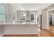 Modern kitchen with white cabinets, quartz countertops, and stainless steel appliances at 929 Rutledge Ave, Charleston, SC 29403
