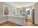 Modern kitchen with white cabinets, quartz countertops, and stainless steel appliances at 929 Rutledge Ave, Charleston, SC 29403