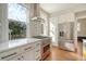 Modern kitchen with stainless steel appliances and white cabinets at 929 Rutledge Ave, Charleston, SC 29403