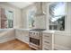 Modern kitchen with stainless steel appliances and white shaker cabinets at 929 Rutledge Ave, Charleston, SC 29403