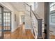 Elegant staircase with white spindles and dark wood accents at 929 Rutledge Ave, Charleston, SC 29403