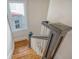 Wooden staircase with white railings, view from above at 929 Rutledge Ave, Charleston, SC 29403