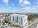 Large building with balconies and a rooftop deck, overlooking the water and city at 1 King St # 503, Charleston, SC 29401