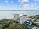 Large waterfront building with balconies and a rooftop deck at 1 King St # 503, Charleston, SC 29401