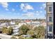 Sweeping aerial view of charming historic homes and lush greenery at 1 King St # 503, Charleston, SC 29401